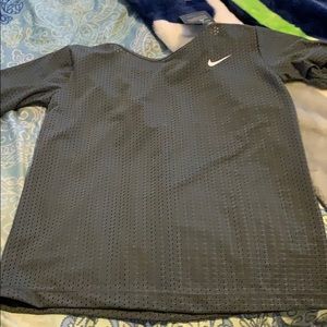 Nike mess top Size states UNI I say Small